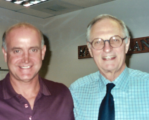 A man and a woman standing next to each other.