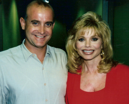 A man and a woman posing for a picture.