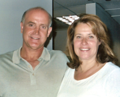 A man and a woman posing for a picture.