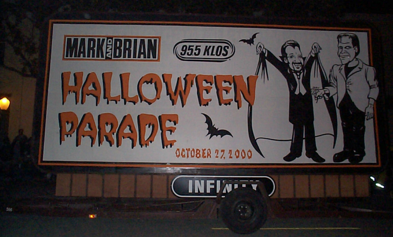 A halloween parade sign.