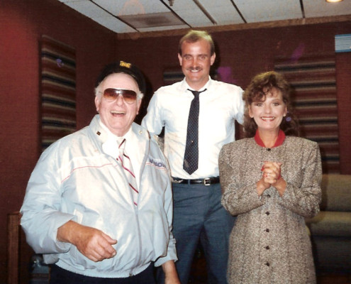 A man and a woman standing next to each other.