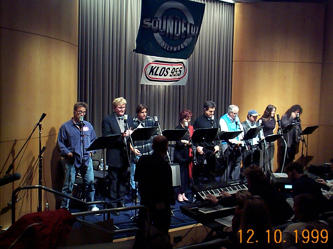 A group of people standing on stage.